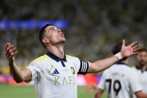 Megabintang Al-Nassr Cristiano Ronaldo berselebrasi merayakan golnya ke gawang Damac dalam laga lanjutan Liga Arab Saudi di Stadion Al-Awwal Park, Riyadh, Arab Saudi, Jumat (22/5/2026) dini hari WIB. (Foto: Antara/AFP/Fayez Nureldine)